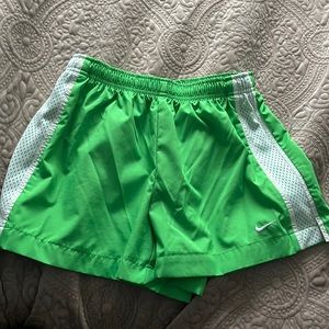 Children’s bright green Nike shorts
